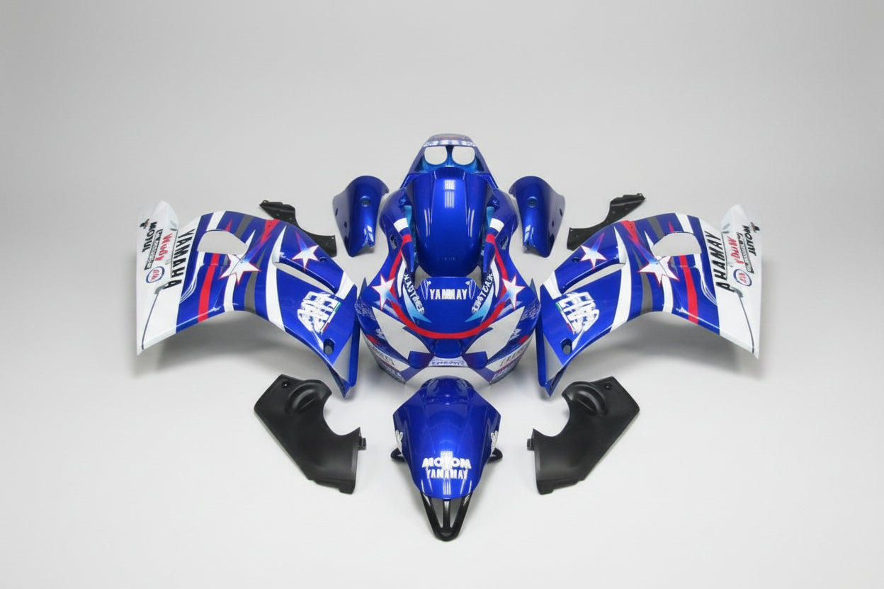 Motorcycle bodywork kit with blue, white, and red design on a white background