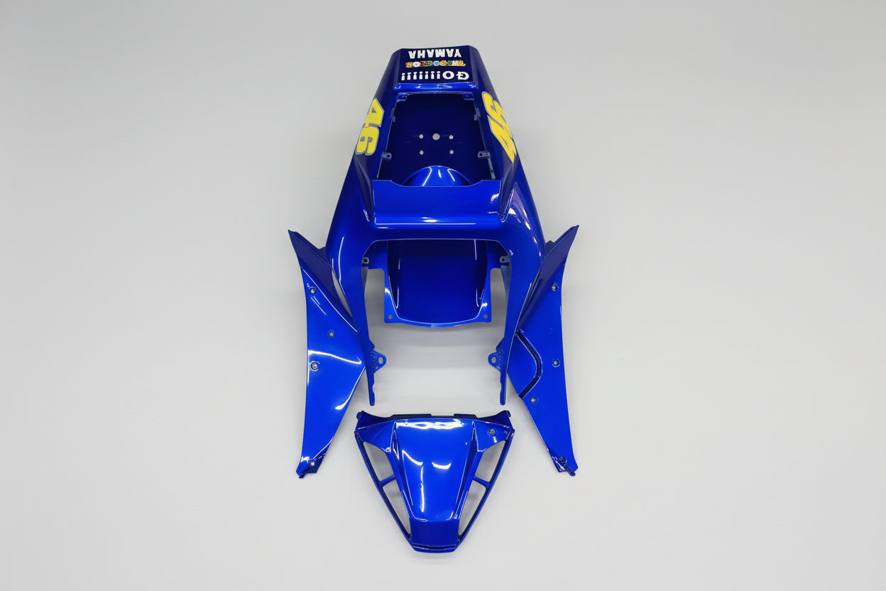 Blue motorcycle body kit with visible branding on a white background