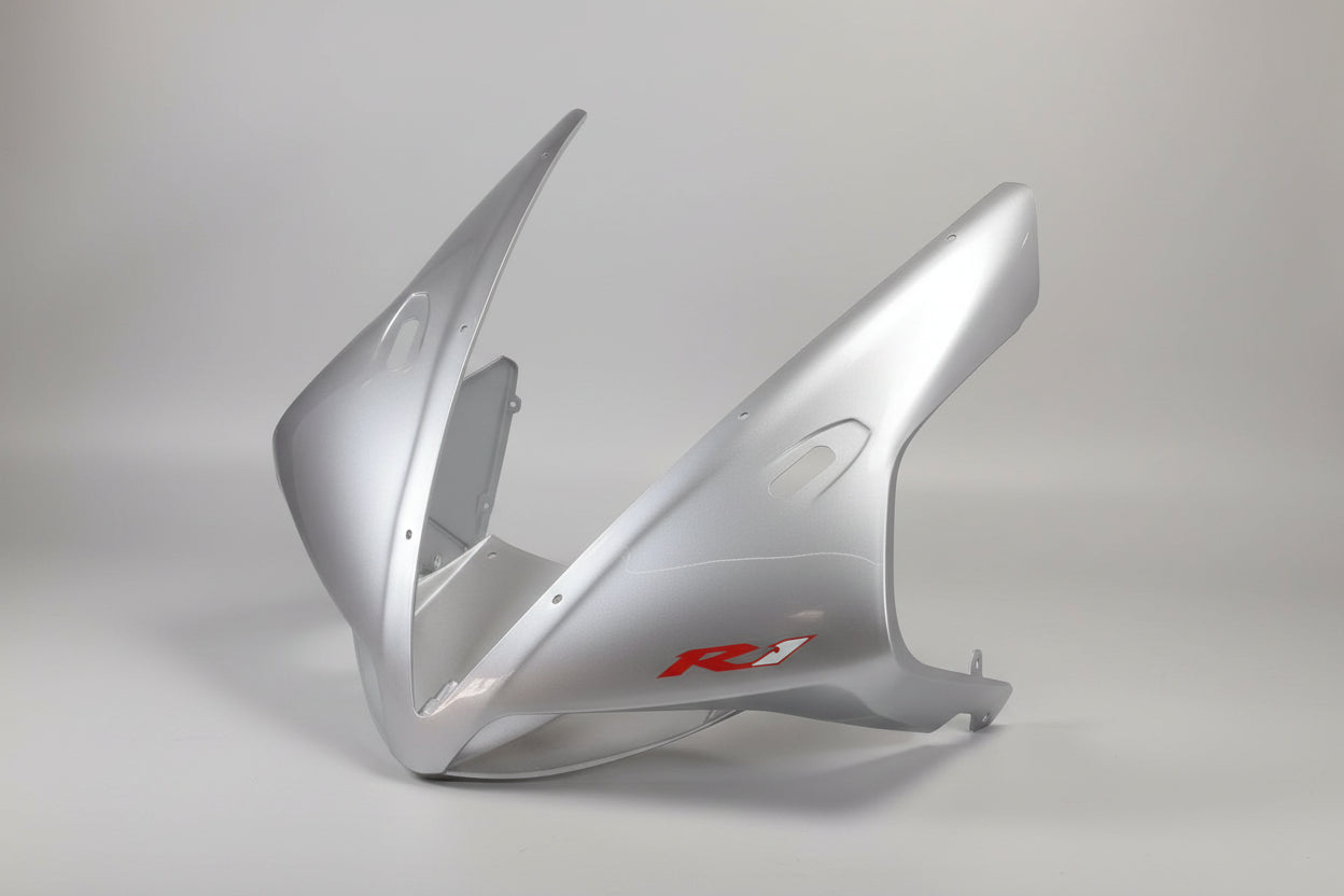 Motorcycle fairing with 'R1' branding on a white background