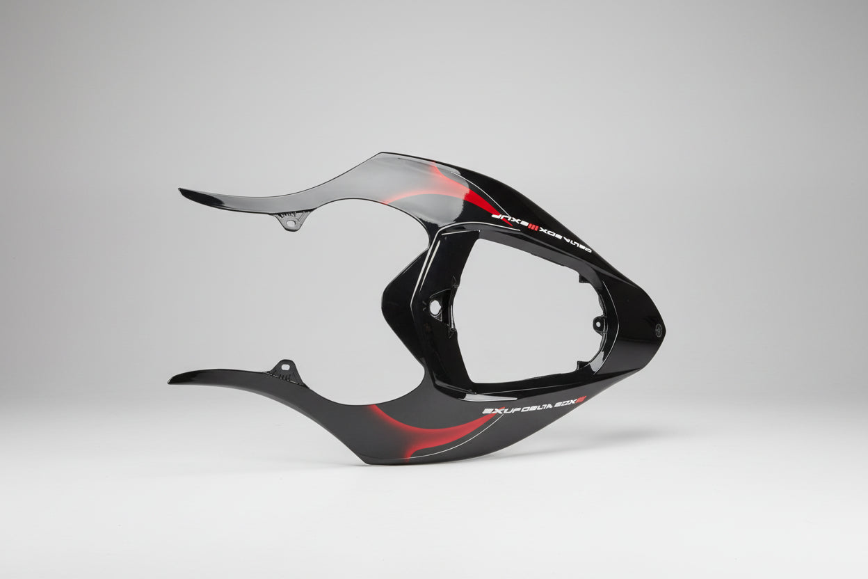 Black motorcycle fairing with red accents on a white background