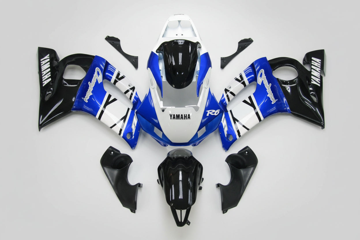 Yamaha R6 motorcycle bodywork kit in blue, white, and black on a white background