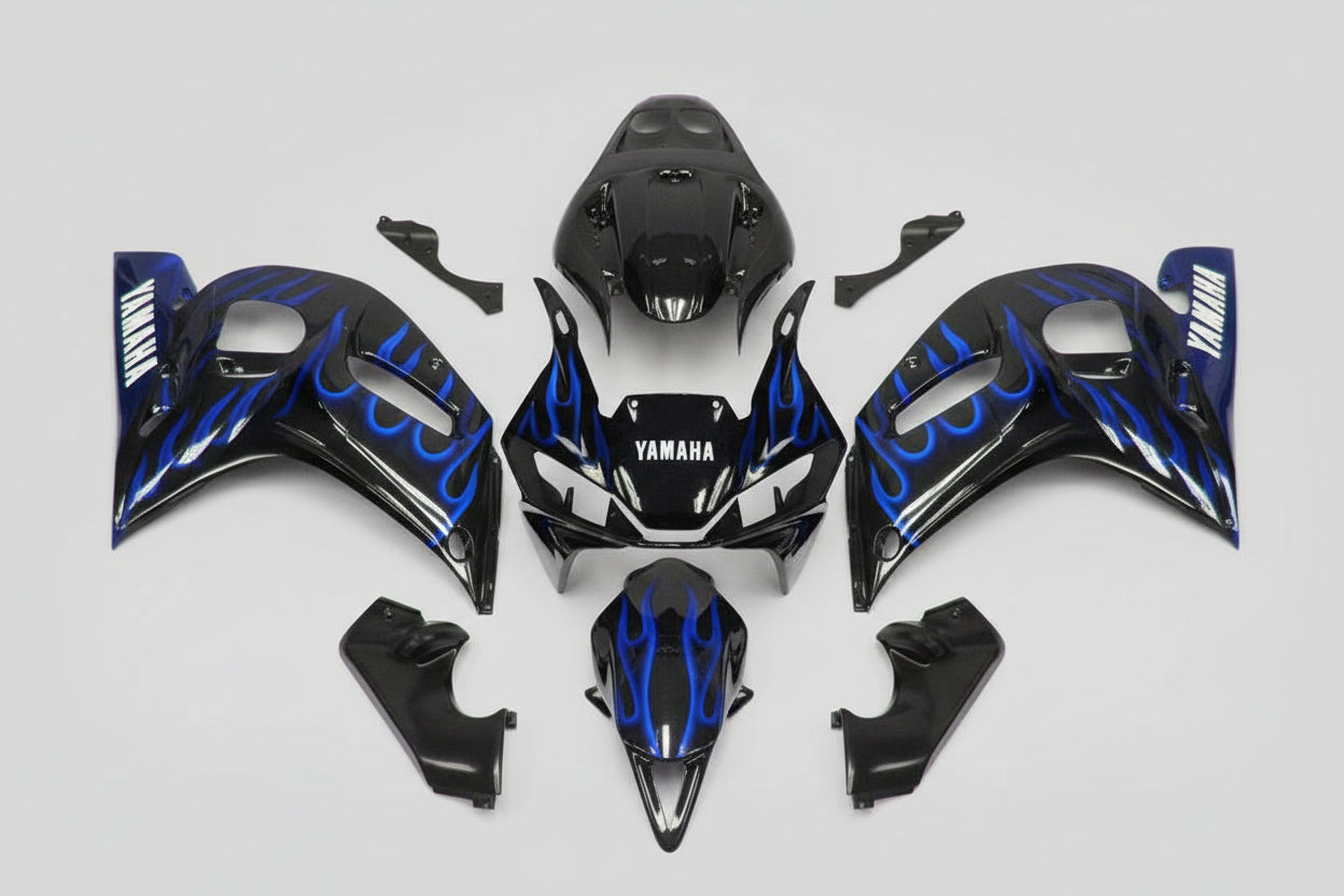 Motorcycle bodywork with blue and black design on a white background
