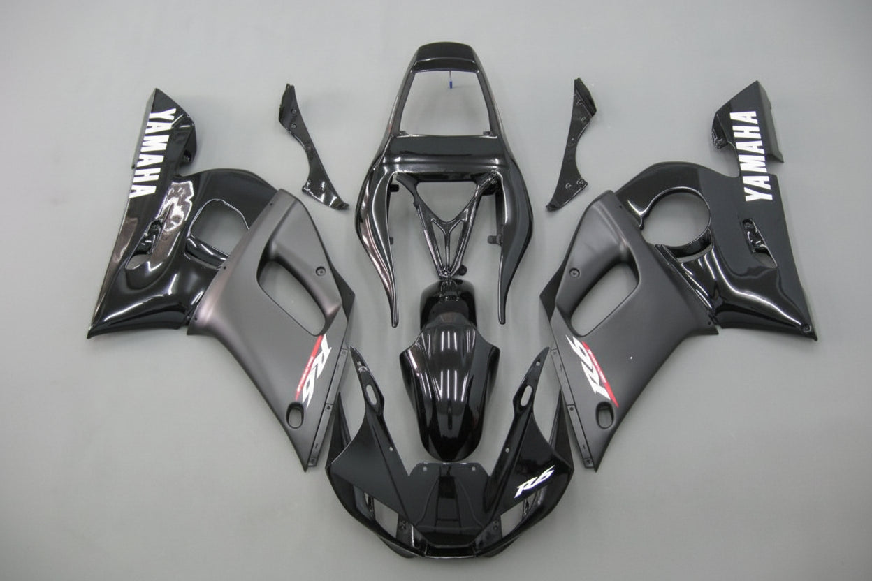 Motorcycle bodywork pieces with Yamaha branding on a gray background