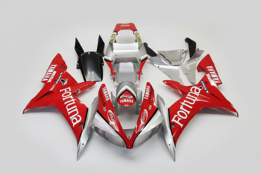 Red and silver motorcycle bodywork with Yamaha and Fortuna branding on a white background