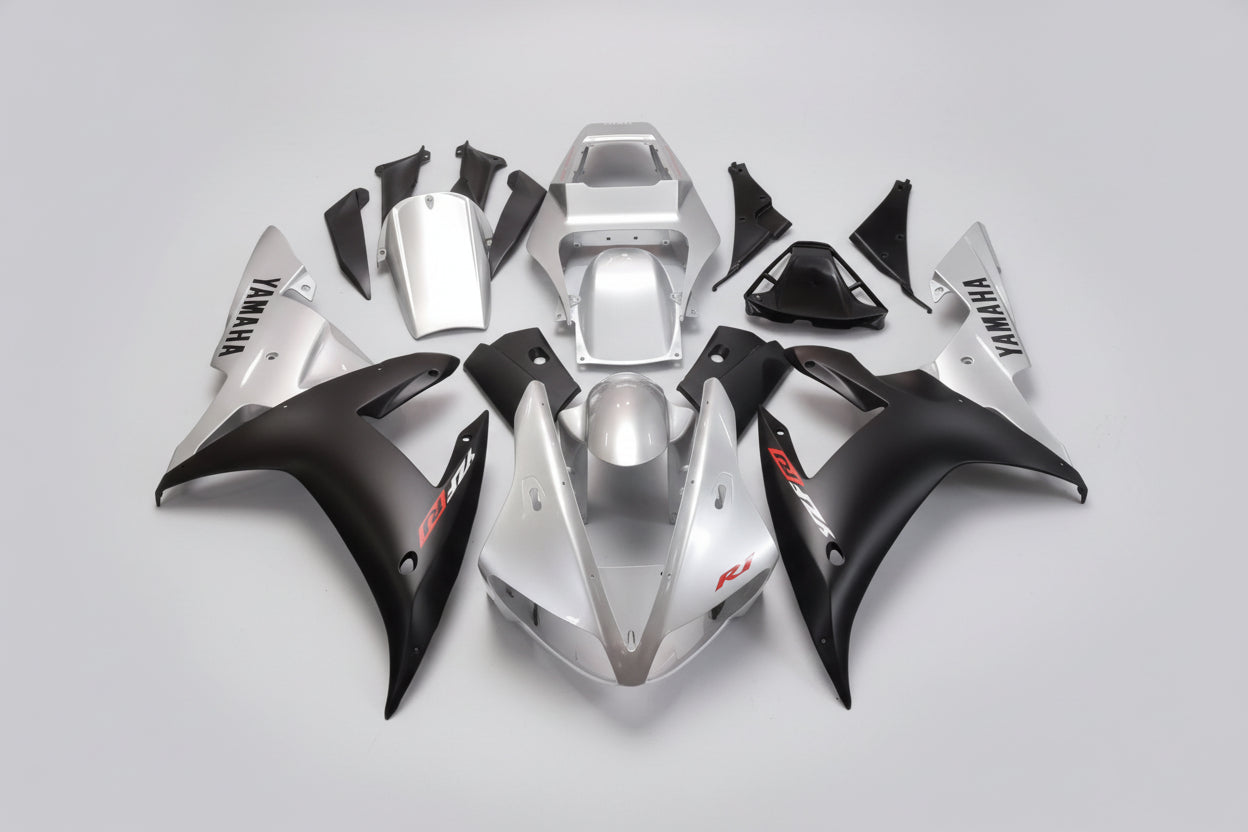 Set of Yamaha motorcycle body parts on a white background