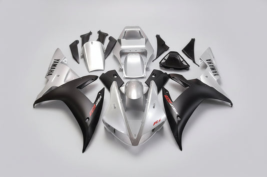 Set of Yamaha motorcycle body parts on a white background