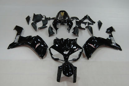 Black motorcycle body parts on a white background