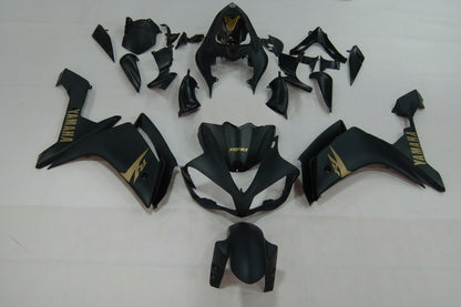 Black motorcycle body parts with Yamaha logo on a white background