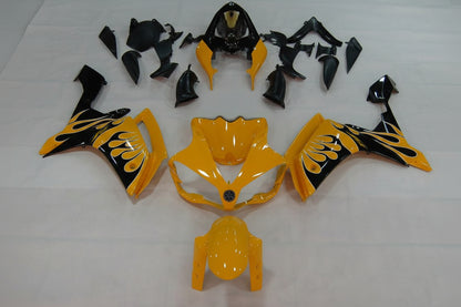Yellow and black motorcycle body parts on a white background