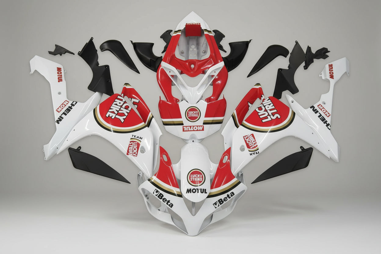 Motorcycle bodywork pieces with visible branding on a gray background