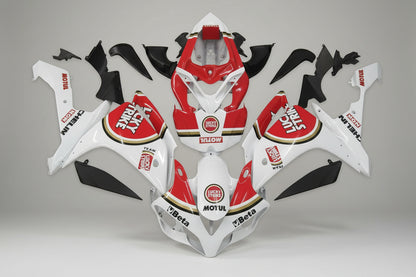 Motorcycle bodywork pieces with visible branding on a gray background