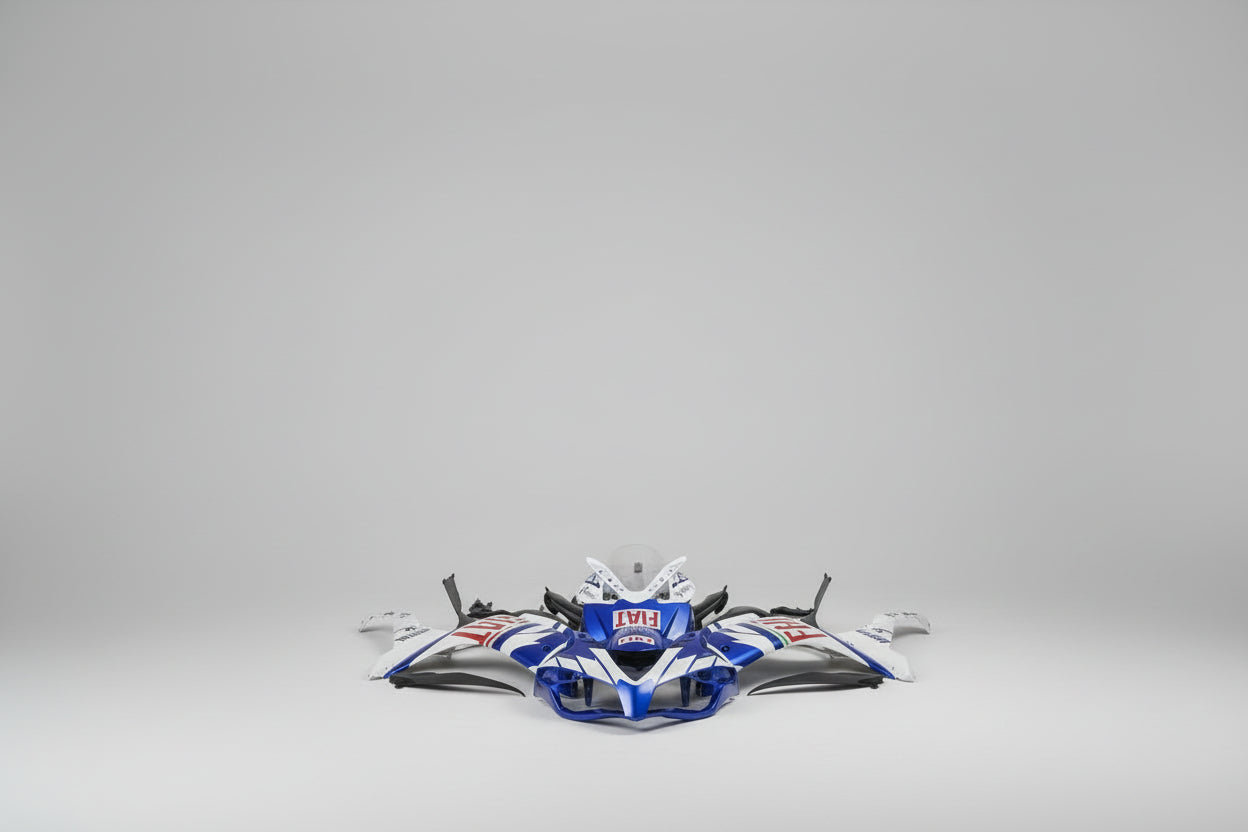Motorcycle parts with Fiat branding on a gray background
