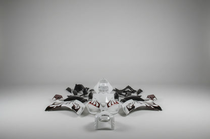Motorcycle body parts with Yamaha logo on a white background