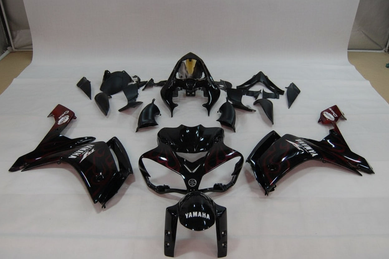 Motorcycle body parts with Yamaha logo on a white background