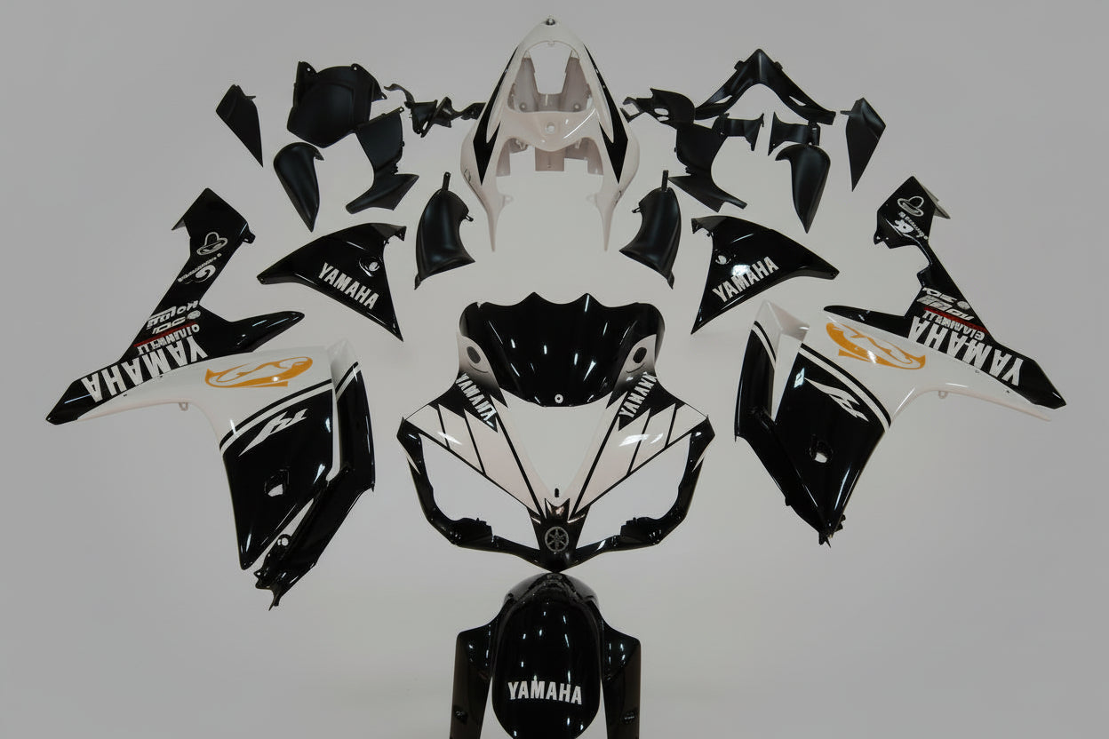 Motorcycle body parts with Yamaha logo on a white background