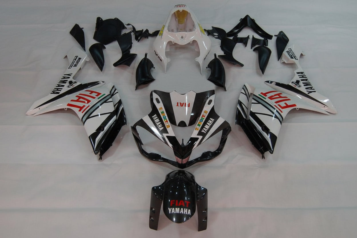 Motorcycle body parts with 'Yamaha' branding on a white background