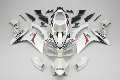 Motorcycle bodywork pieces with Yamaha branding on a white background