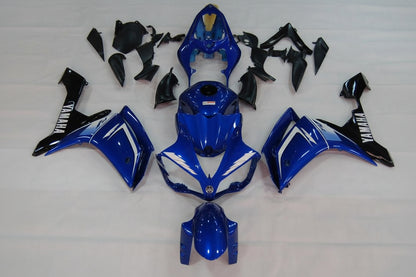 Blue and black motorcycle body parts on a white background
