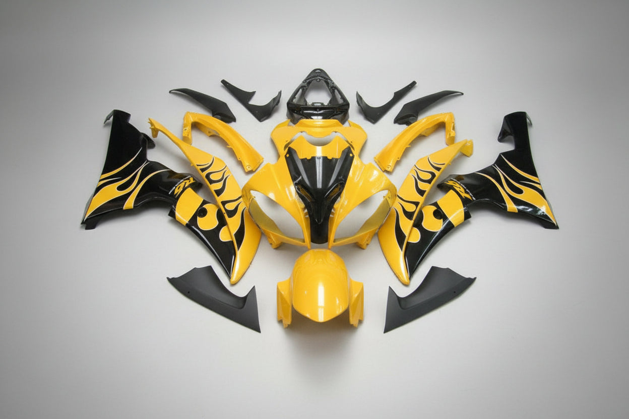 Yellow and black motorcycle body parts on a white background
