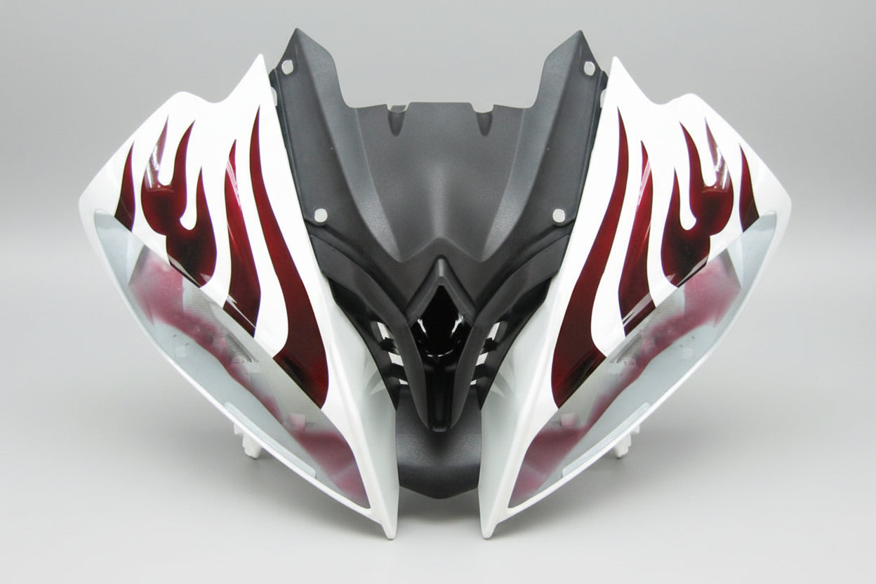 Motorcycle fairing with red flame design on a white background