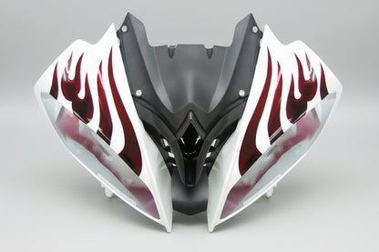 Motorcycle fairing with red flame design on a white background