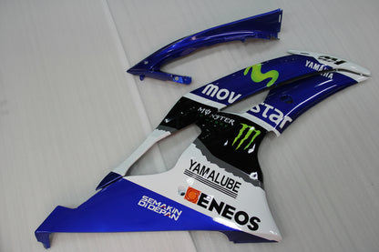 Motorcycle fairing with multiple brand logos on a white background