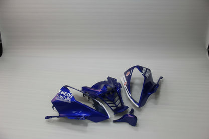 Blue motorcycle fairing parts with 'Yamalube' branding on a white background