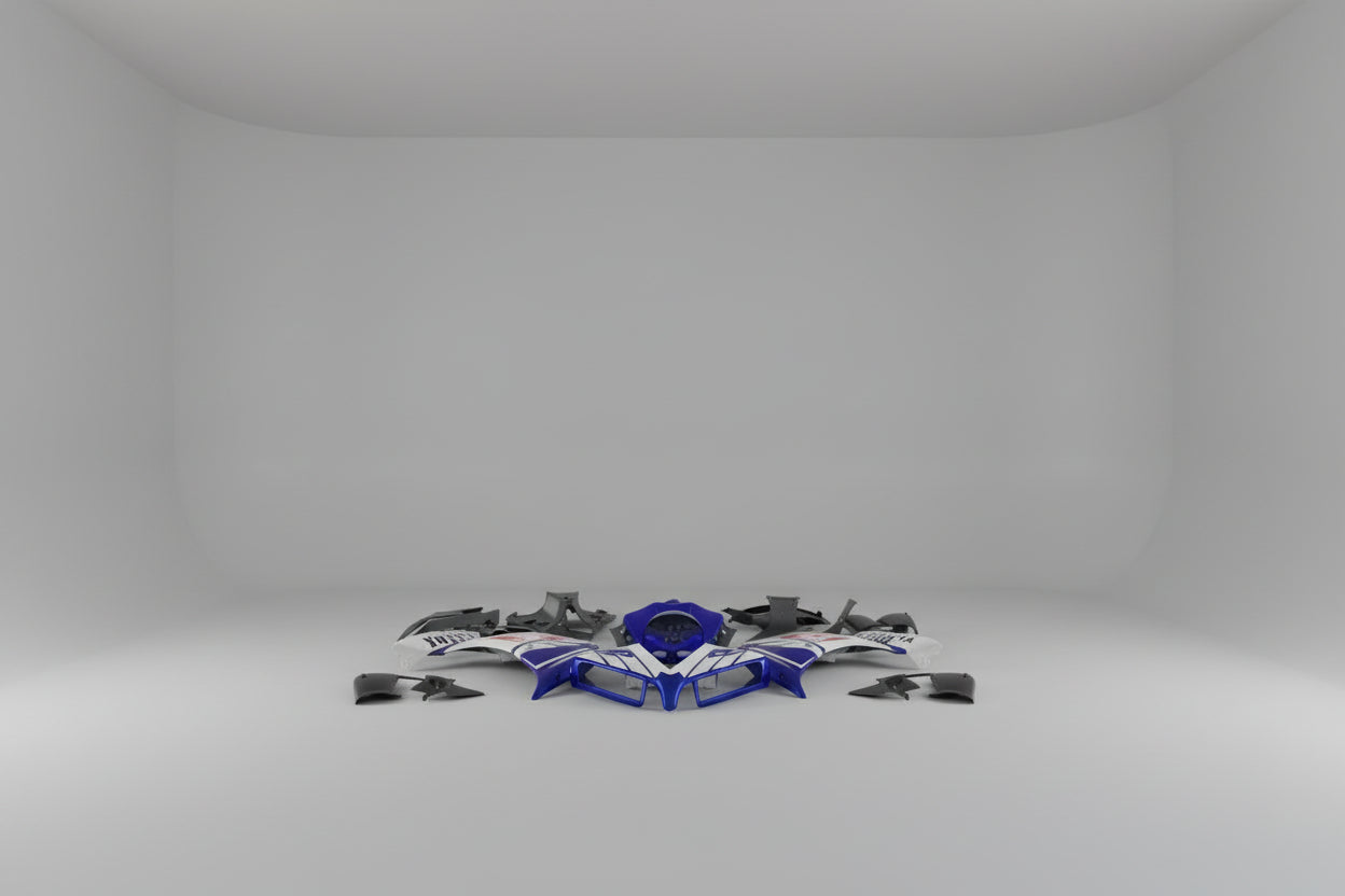 Motorcycle body parts with Yamaha branding on a white background