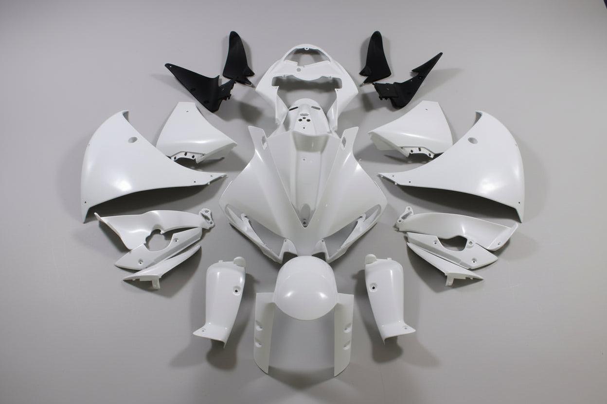 Yamaha motorcycle with white bodywork pieces on a gray background