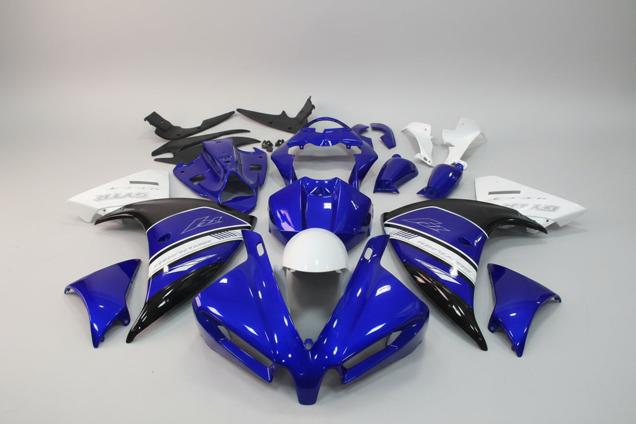 Motorcycle bodywork pieces in blue and black on a white background