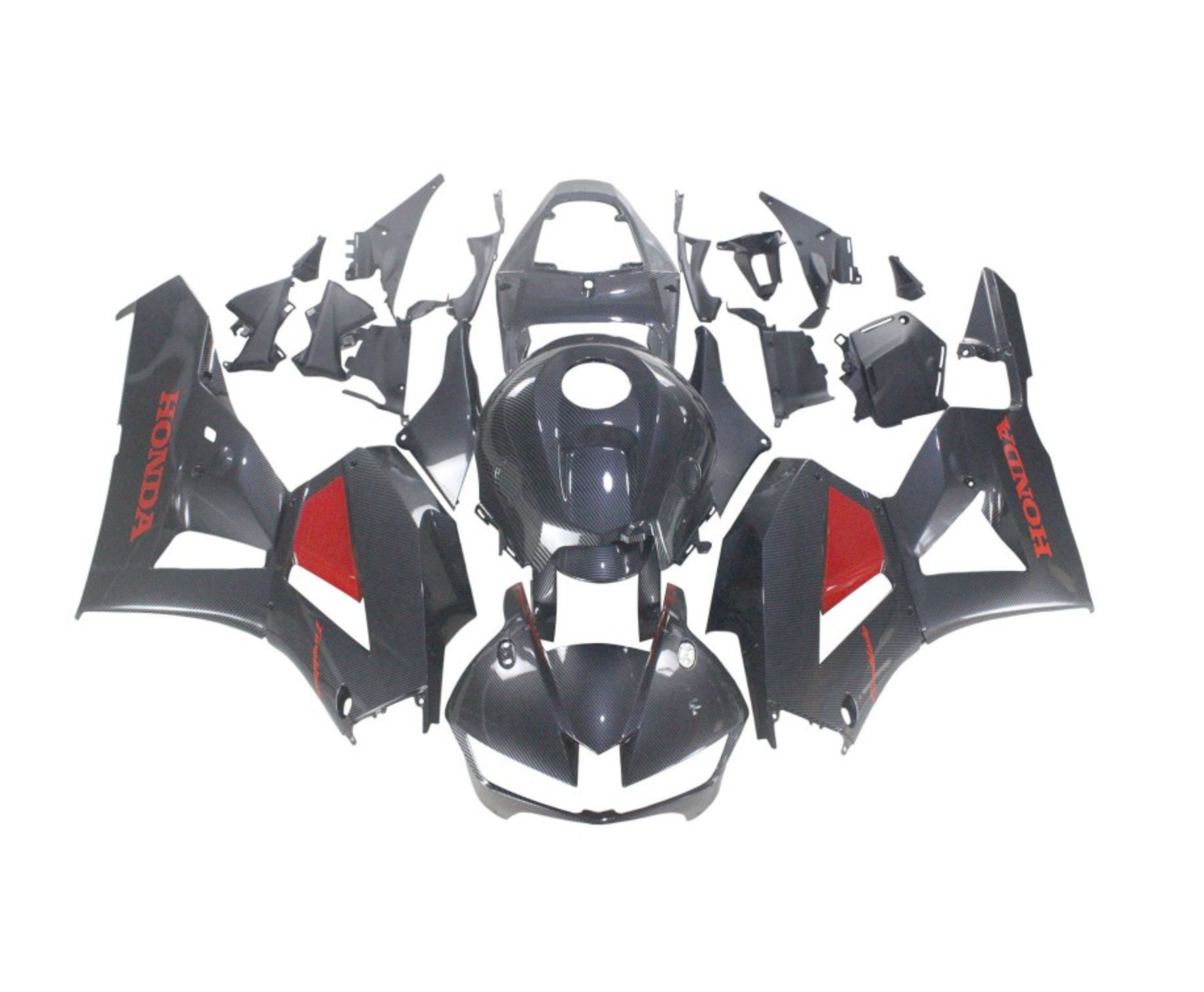 Motorcycle bodywork pieces with 'HONDA' branding on a white background