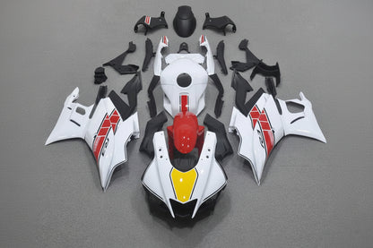 Motorcycle body parts on a gray background