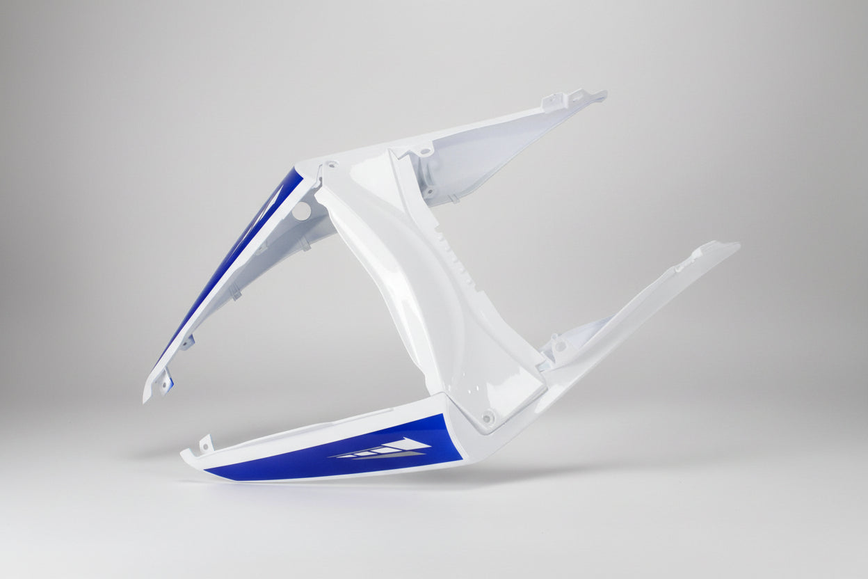 White and blue motorcycle fairing on a white background