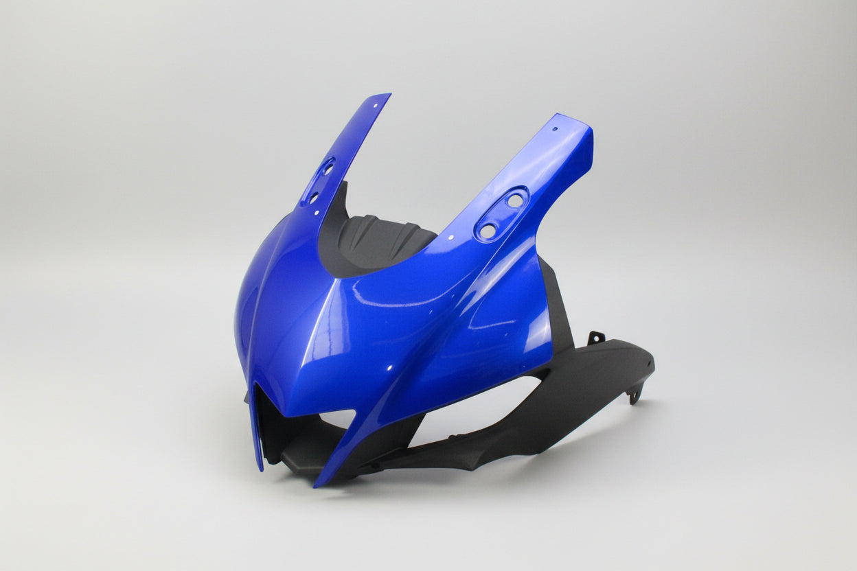 Blue motorcycle windshield on a white background
