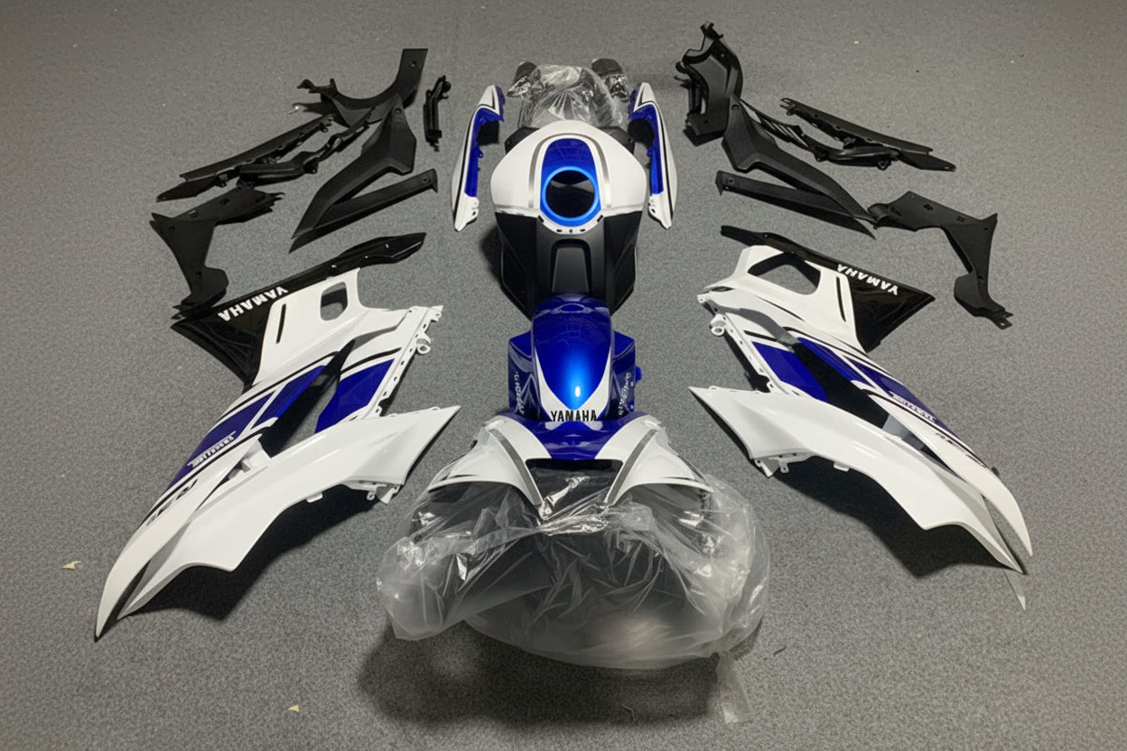 Motorcycle parts with 'Yamaha' branding on a gray background