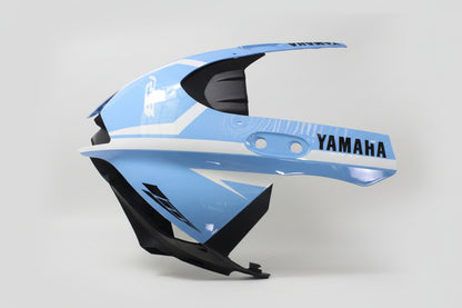 Blue and black motorcycle fairing with Yamaha branding on a white background
