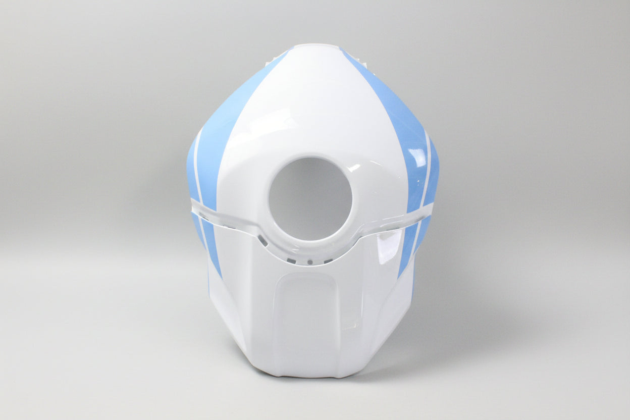 White and blue helmet with a circular opening on a white background