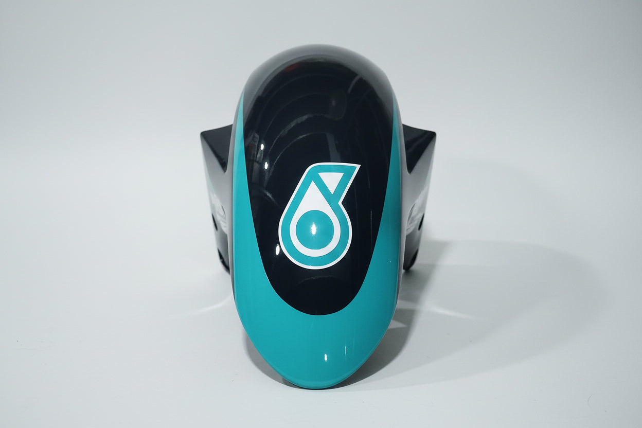 Teal and black device with a logo on a white background