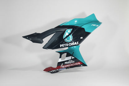 Motorcycle fairing with Petronas and Barracuda branding on a white background