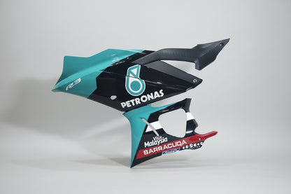Motorcycle fairing with Petronas and Barracuda branding on a white background