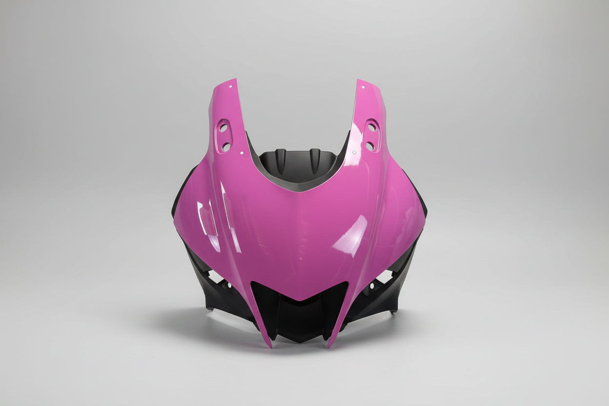 Pink motorcycle fairing on a white background