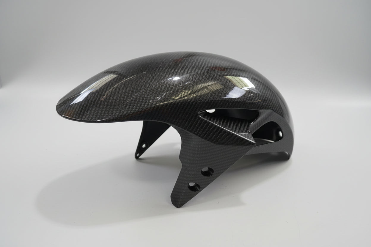 Black motorcycle fairing on a white background