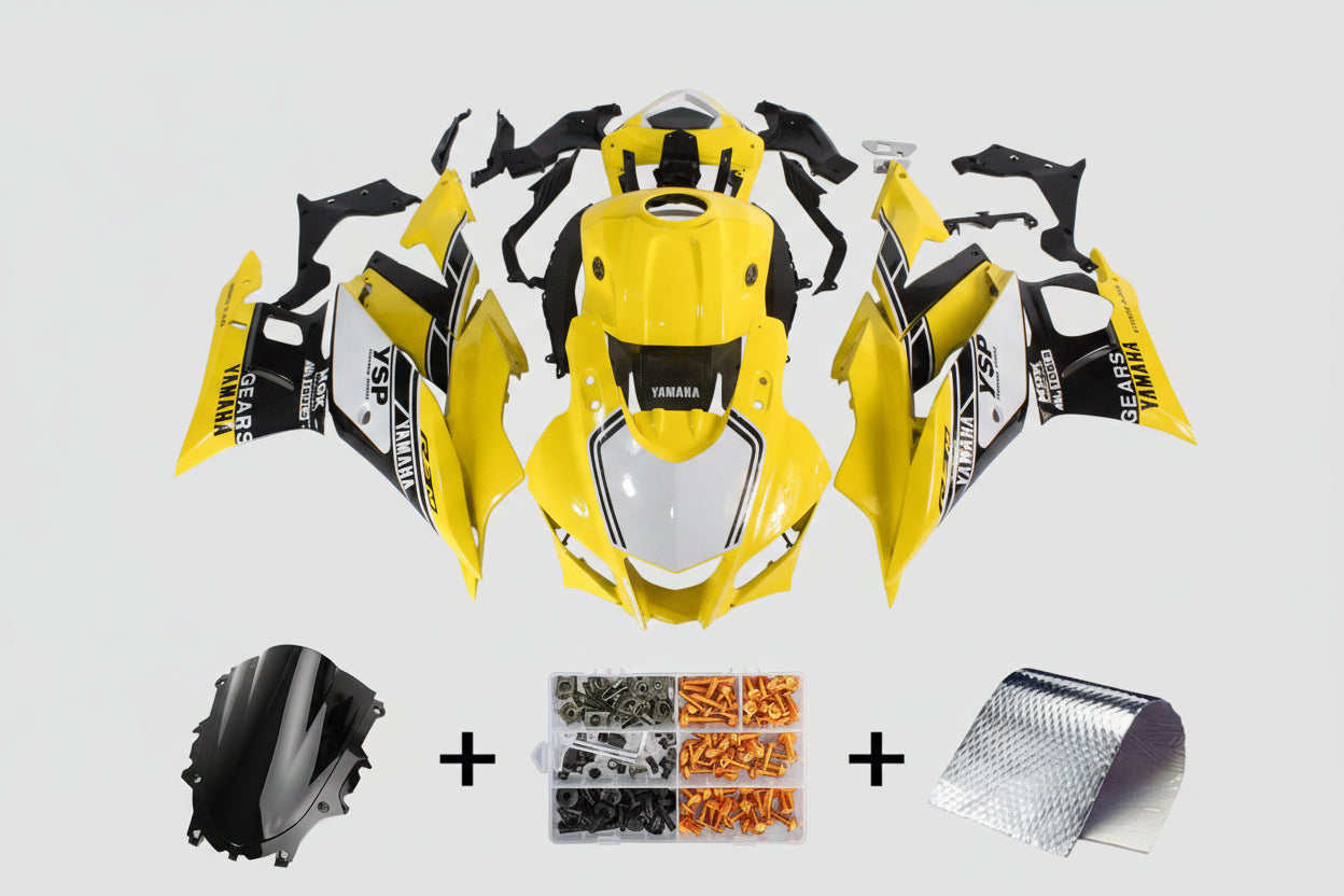 Yellow motorcycle body kit with Yamaha branding, screws, and other parts on a white background