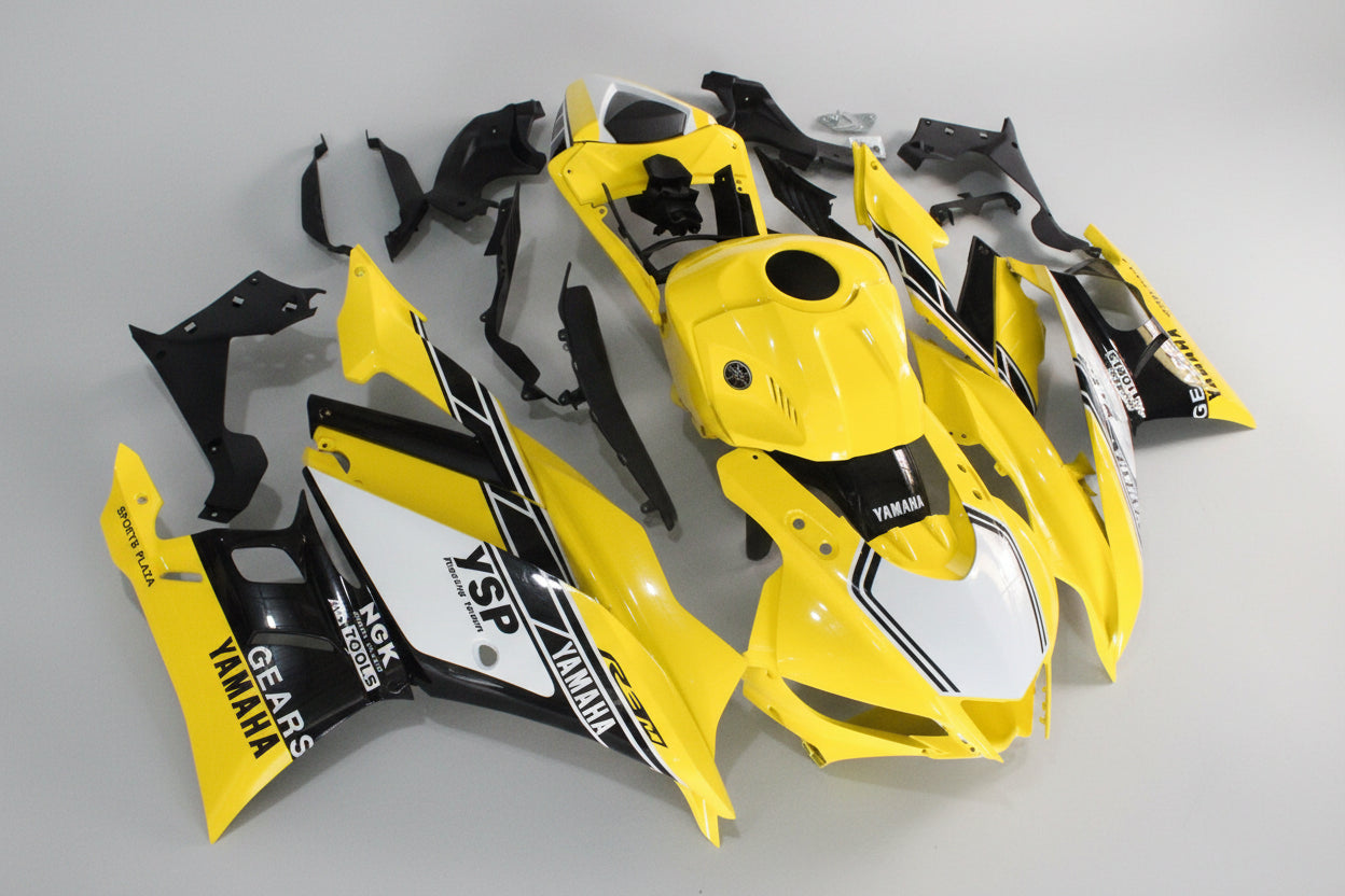 Yellow and black motorcycle body panels with Yamaha branding on a white background