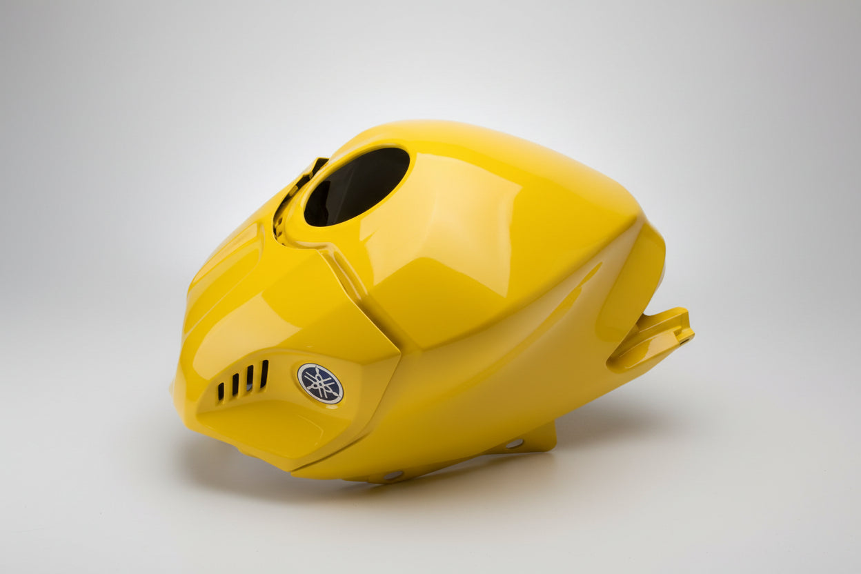 Yellow motorcycle seat cover with a brand logo on a white background
