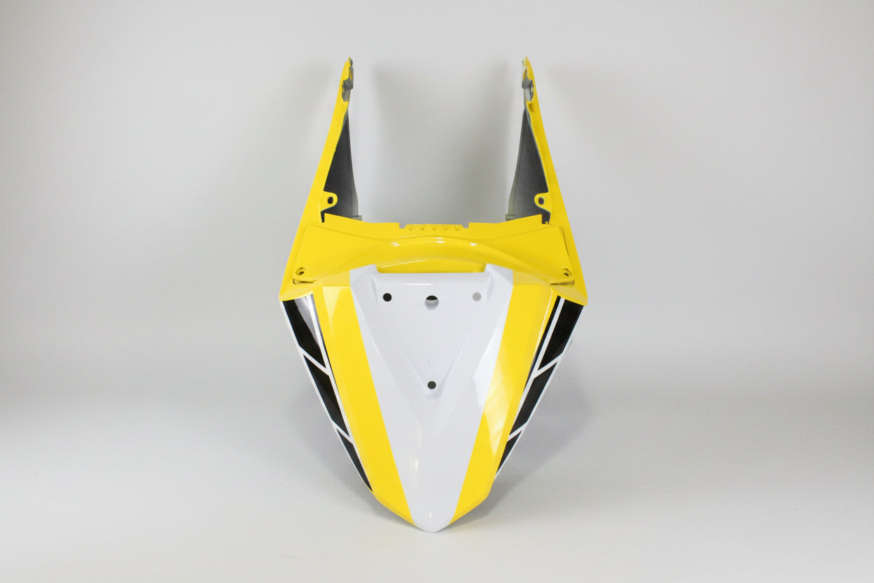 Yellow and black motorcycle fairing on a white background