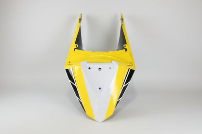 Yellow and black motorcycle fairing on a white background