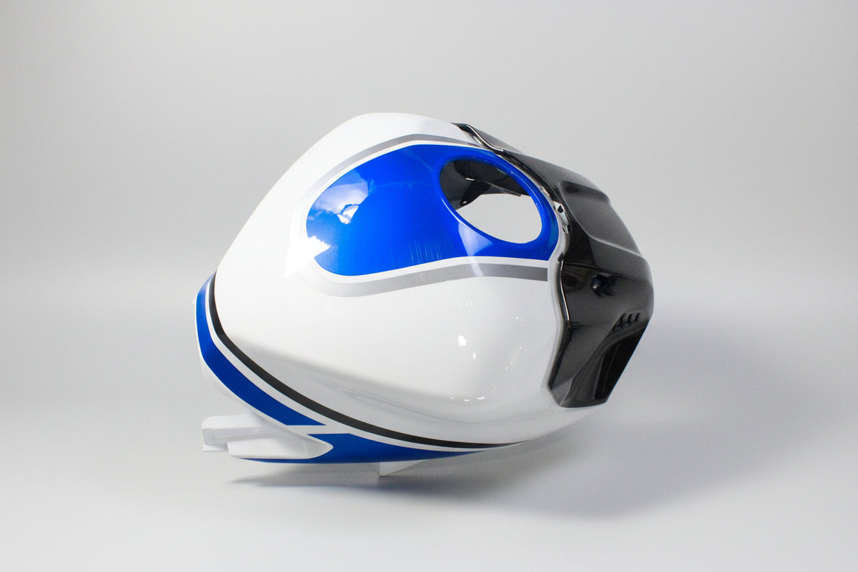 Motorcycle paintball tank with blue and white design on a white background