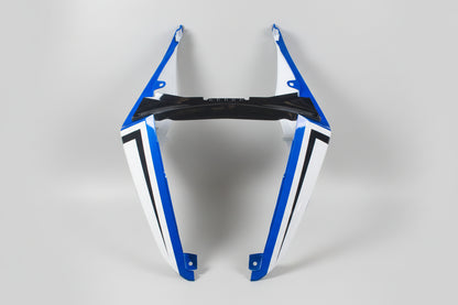 Motorcycle fairing with blue and white design on a white background