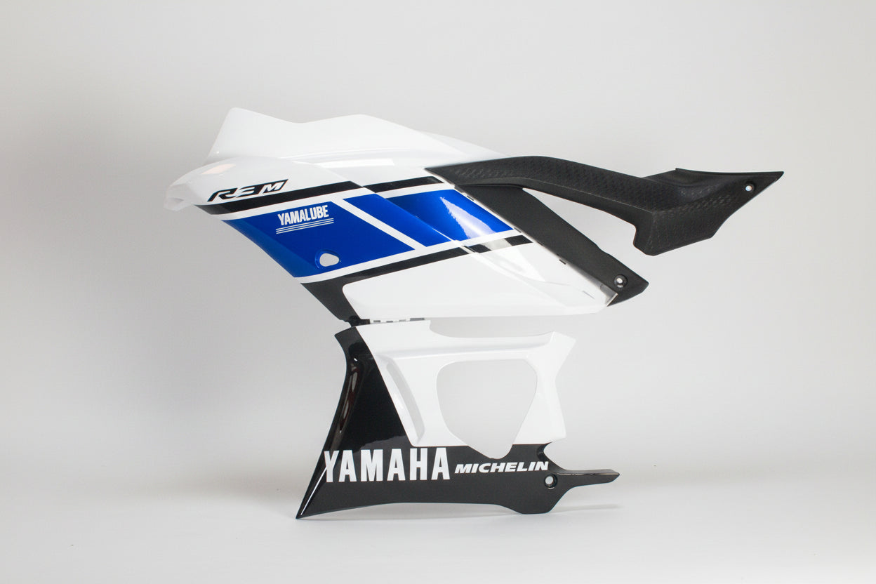 Motorcycle fairing with Yamaha and Michelin branding on a white background